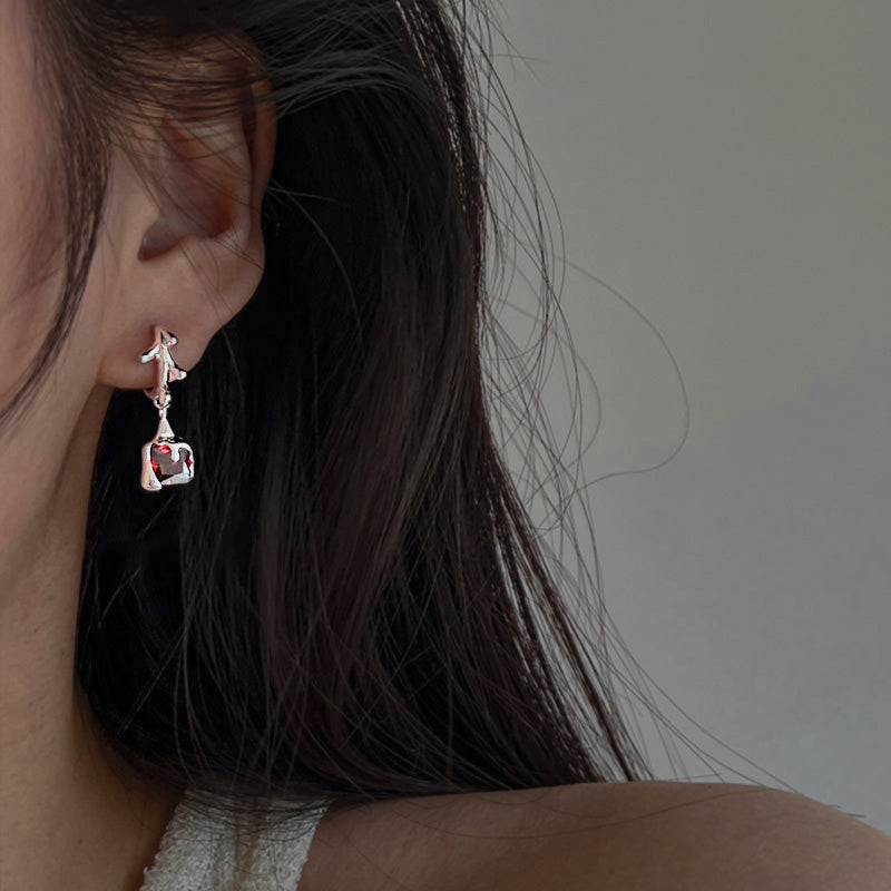 Sterling Silver Melting Huggie Hoop Earrings With Ruby Cubic Zirconia Drops